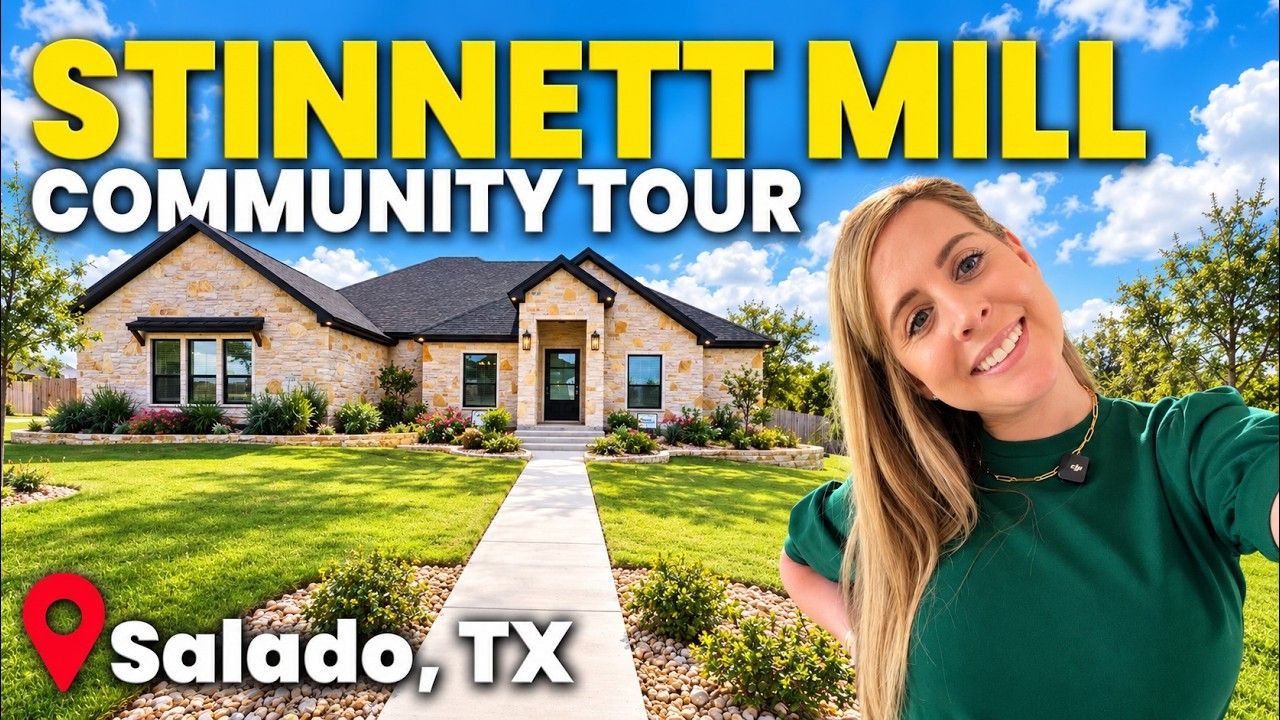 A woman stands in front of a new construction home with a landscaped yard in Salado, Texas.