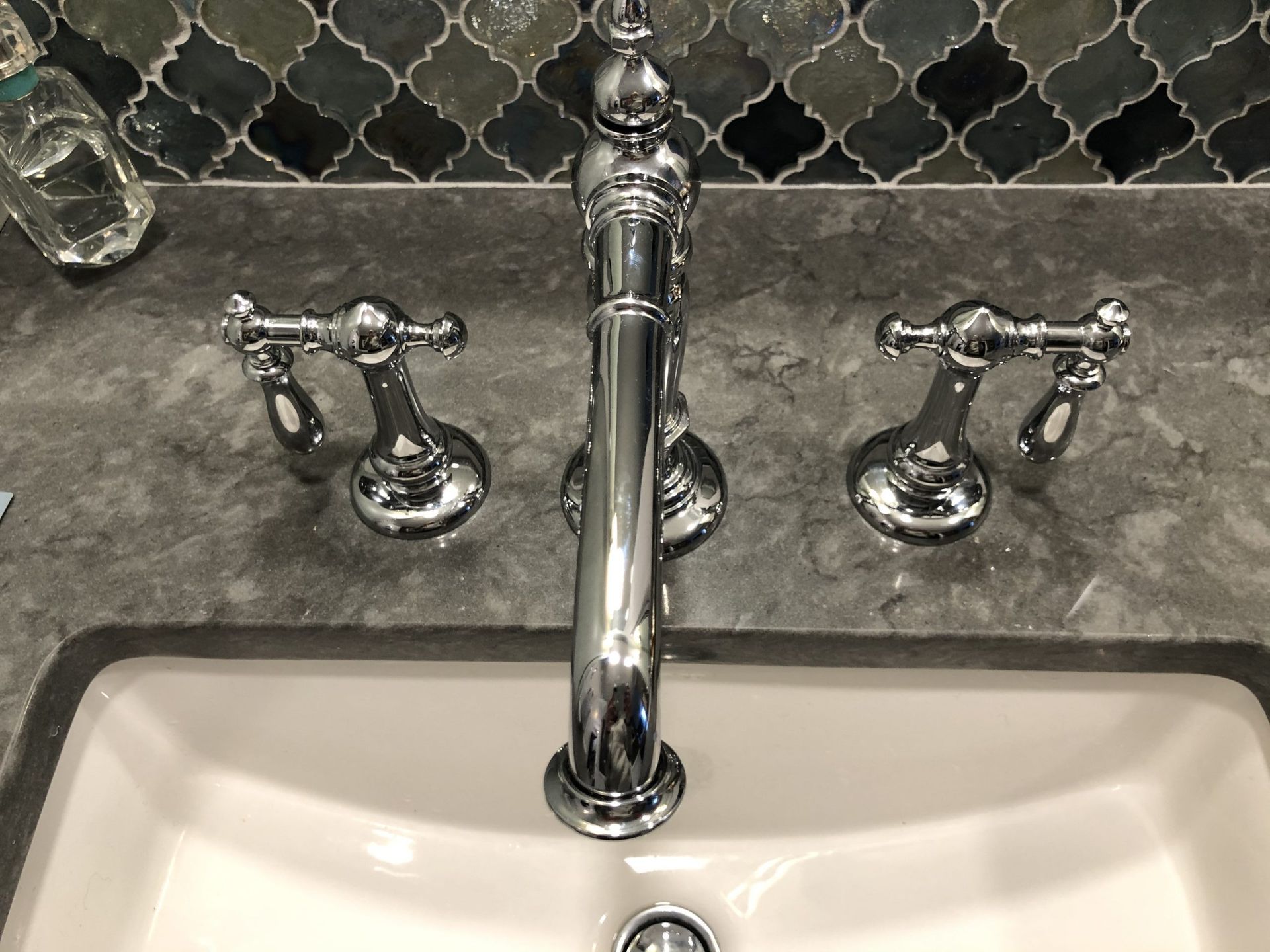 A Bathroom Sink with A Chrome Faucet and Handles | Tonao, VA | Don Kendrick