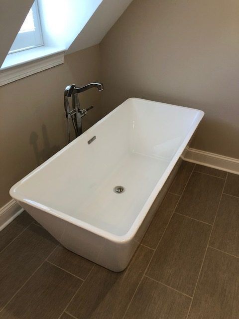 White Bathtub with Chrome Faucet in a Bathroom | Tonao, VA | Don Kendrick