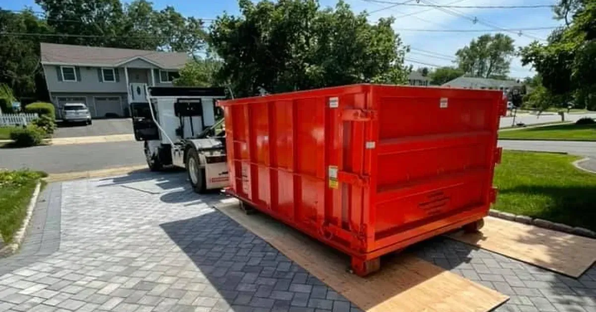 roll-off dumpster for a home cleanout on a Lacey NJ driveway