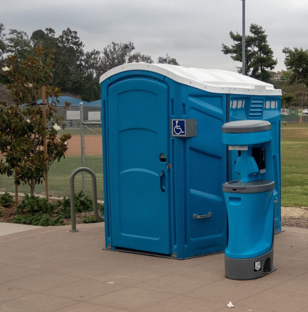 A Blue Portable Toilet — Coffs Coast and Country Temp Fence in Sapphire Beach, NSW