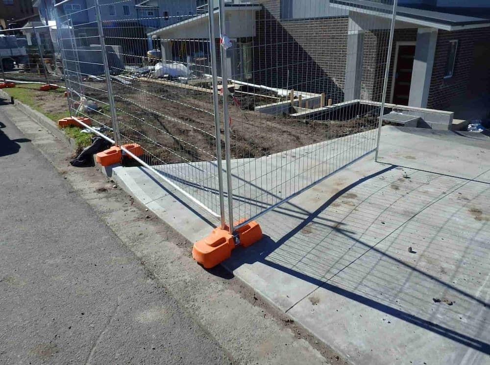 A Temporary Fence is Surrounding a House Under Construction — Coffs Coast and Country Temp Fence in Sapphire Beach, NSW