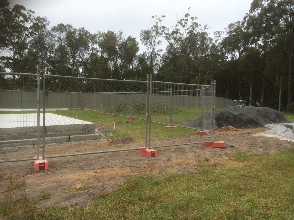 A Temporary Fence Surrounds a Construction Site — Coffs Coast and Country Temp Fence in Sapphire Beach, NSW