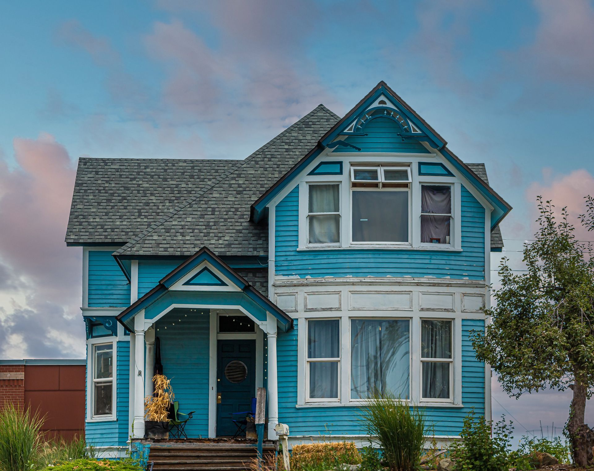 Older two-story home with original wood siding and trim rewired by SRP Electric in San Diego, CA Older two-story home with original wood siding and trim rewired by SRP Electric in San Diego, CA