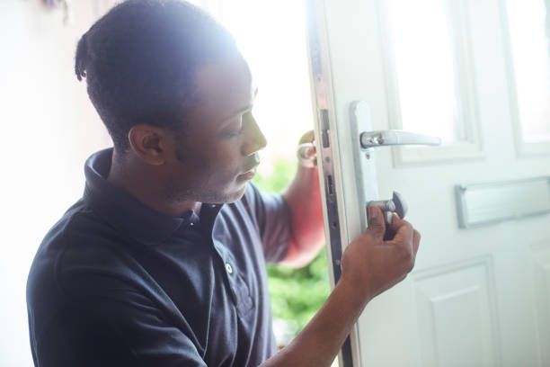 A person opening a door l Professional Locksmith Gulfport Ms l ProLock Locksmith Services LLC