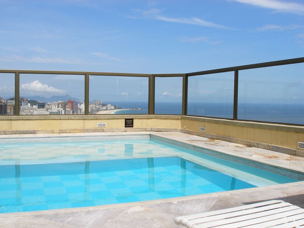 A Rooftop Swimming Pool Overlooking a Coastal City Skyline — Get My Pool Certified in Broadbeach Waters, QLD
