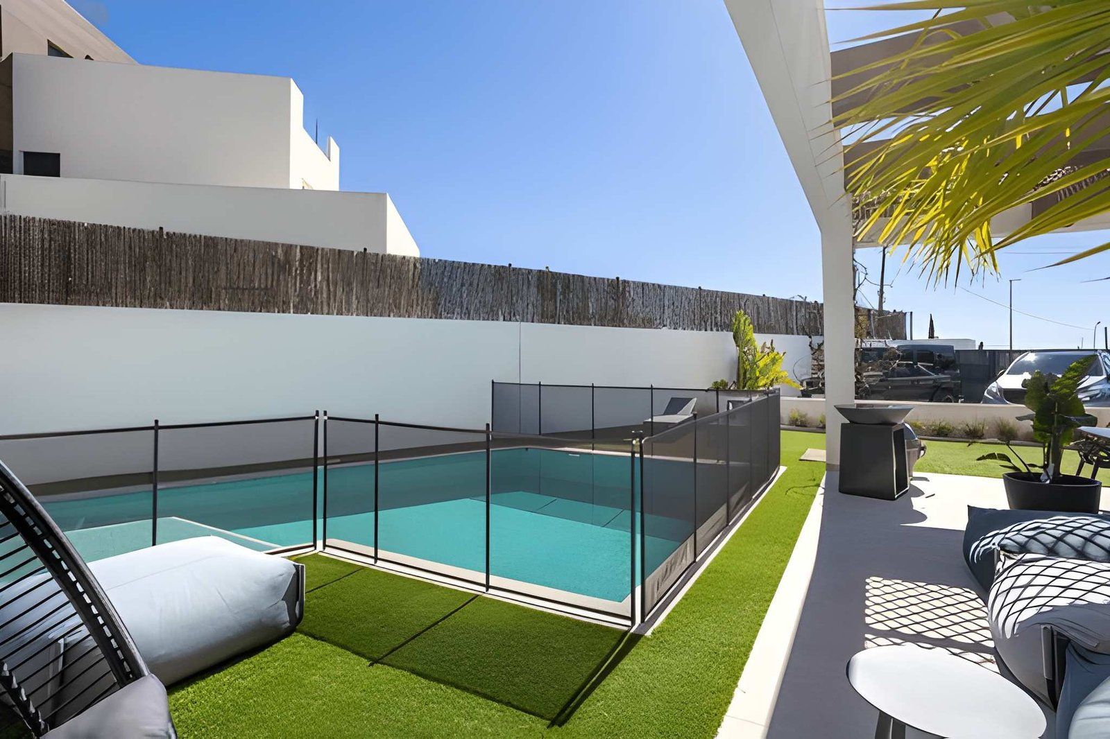 A Backyard Patio With a Swimming Pool — Get My Pool Certified in Burleigh Heads, QLD