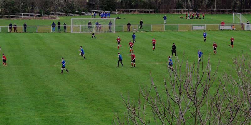 Barrow Town FC players and supporters at the club