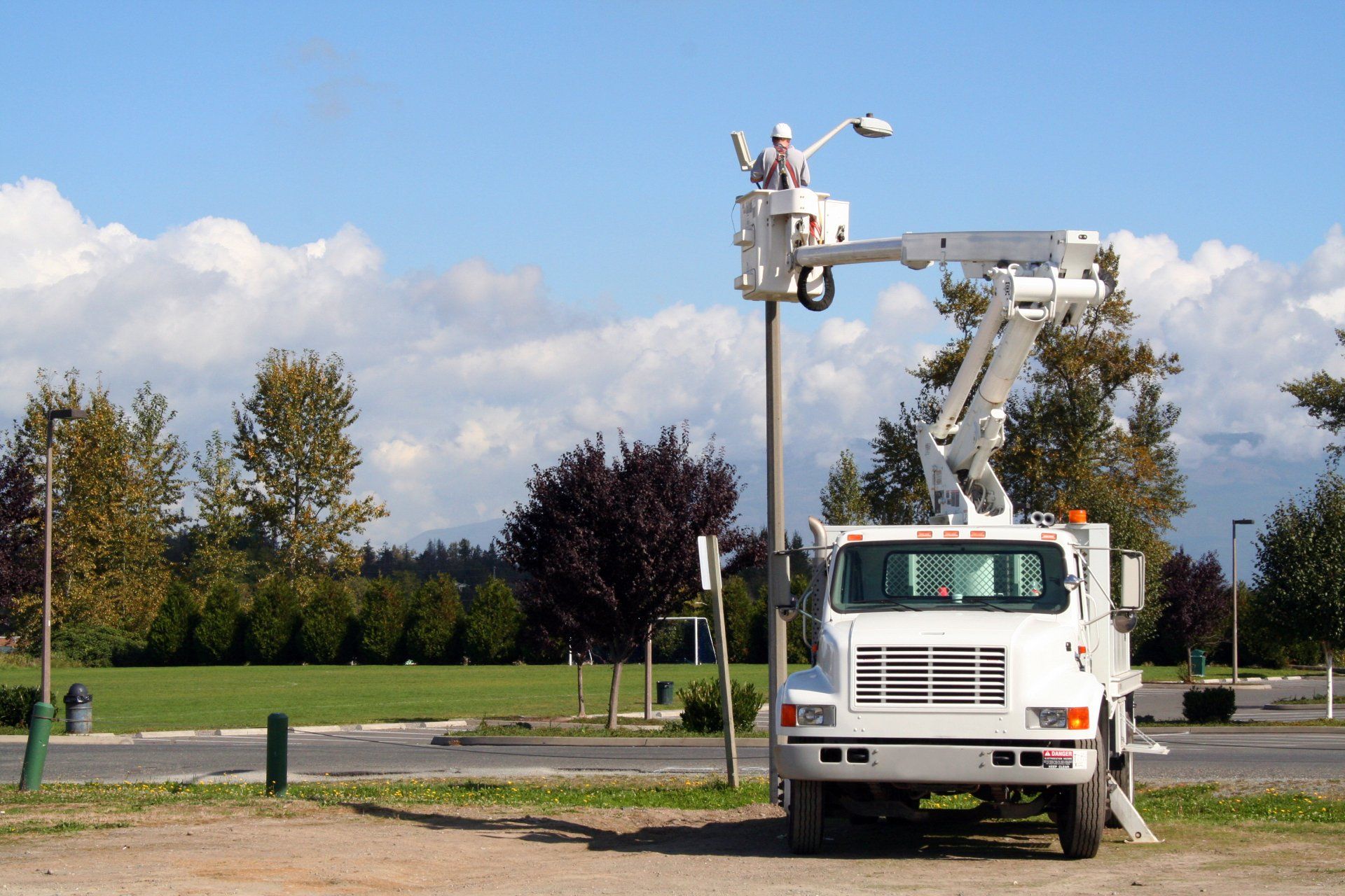 Hydro Men Working On A New Line — Ipswich QLD — Enever Electrical Pty Ltd