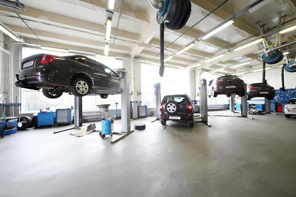 A Car Is On A Lift Garage — Stanger Automatics In Ballina, NSW
