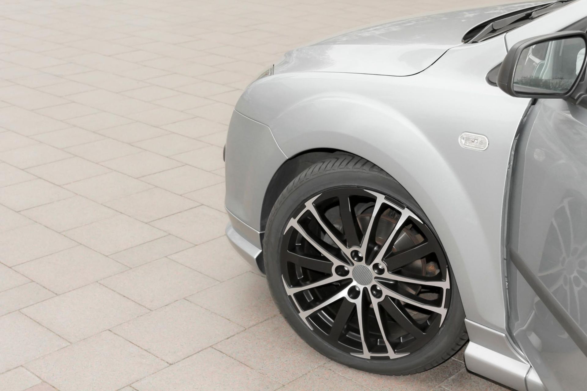 A Silver Car With Black Wheels Is Parked — Stanger Automatics In Ballina, NSW