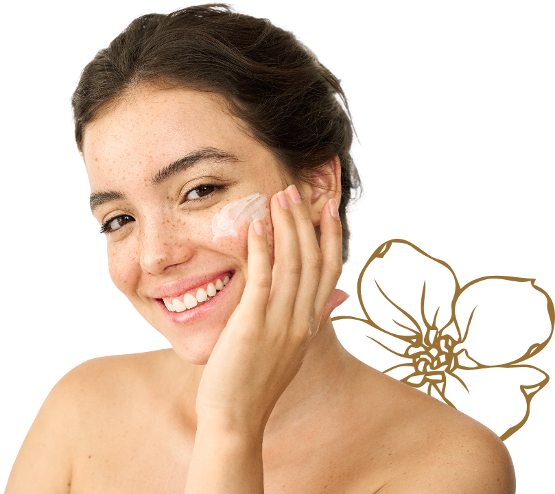 Smiling woman applying face cream on bare shoulder against a white background