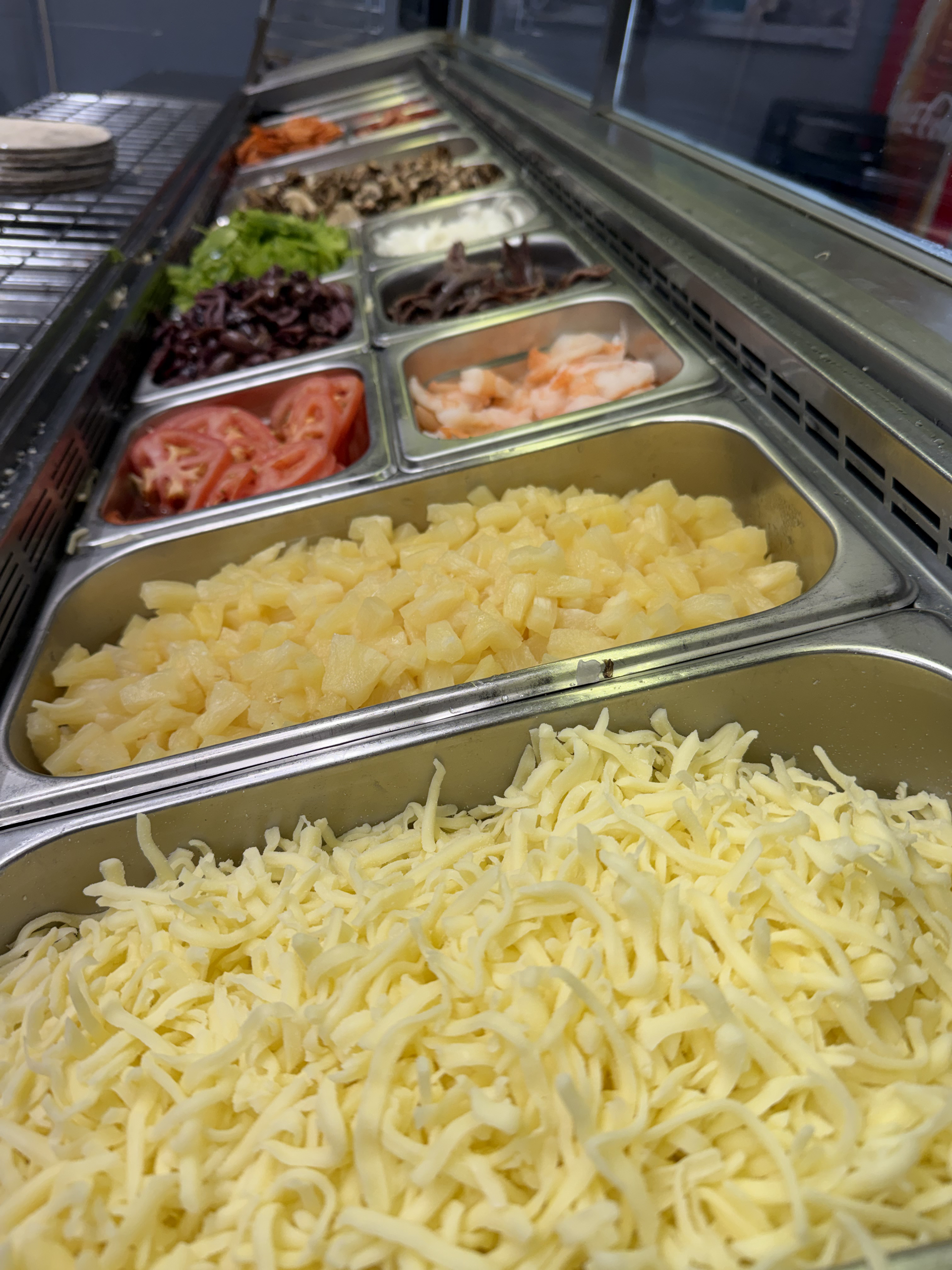 A Pizza With A Lot Of Toppings On It — Bel-Air Pizza In Port Macquarie, NSW