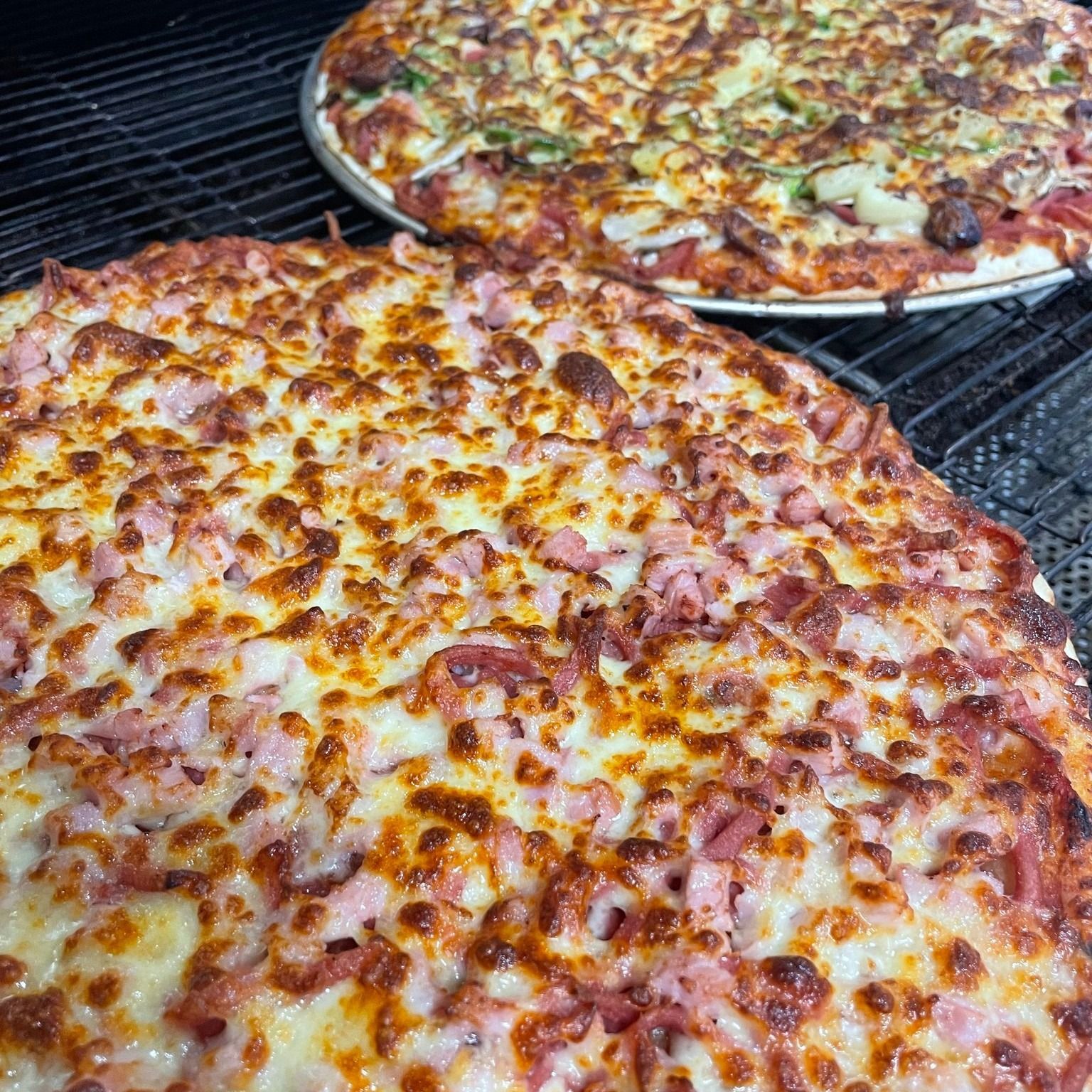 A Pizza With Bananas On It And A Pizza With Cheese On It — Bel-Air Pizza In Port Macquarie, NSW