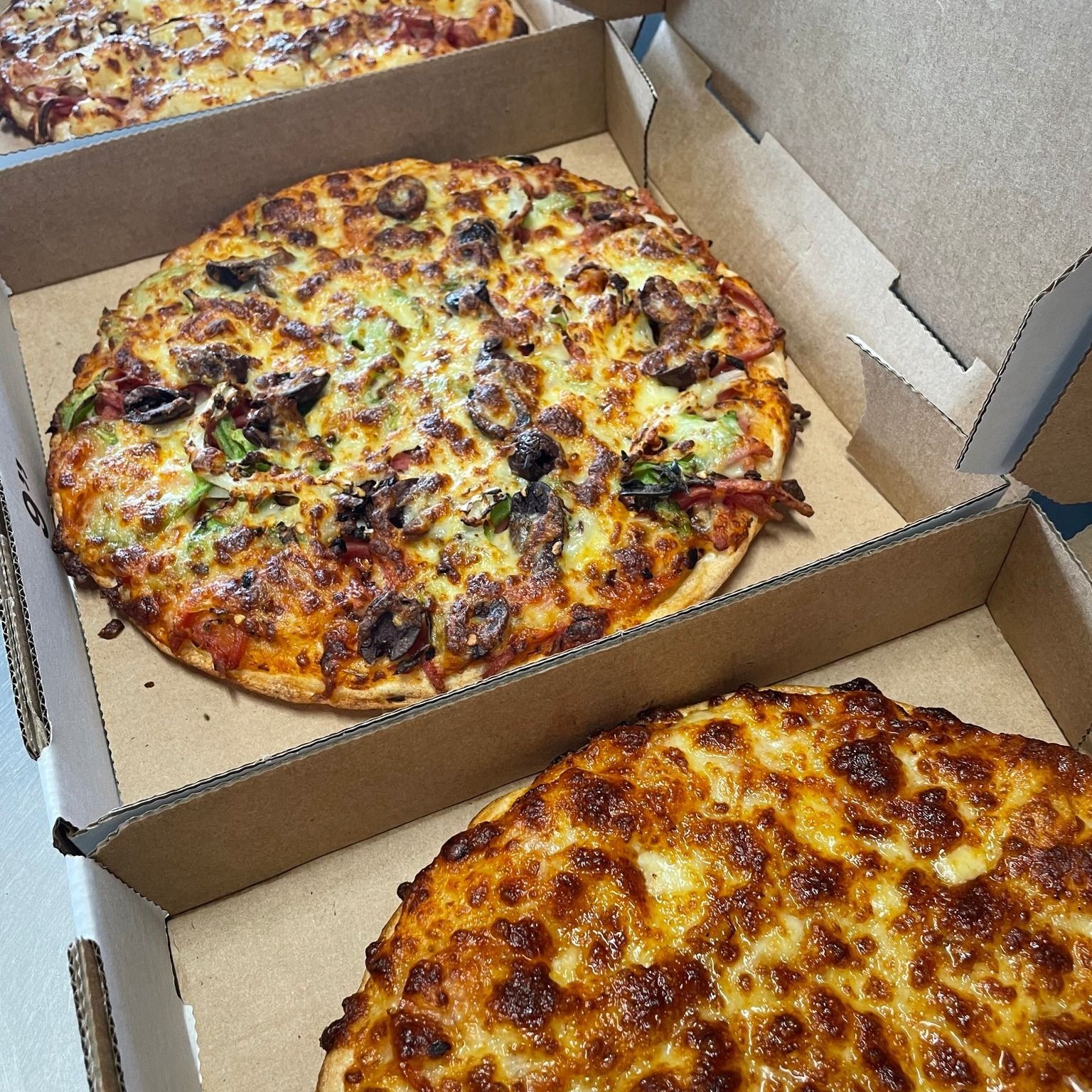 There Are Many Different Types Of Food In The Trays — Bel-Air Pizza In Port Macquarie, NSW