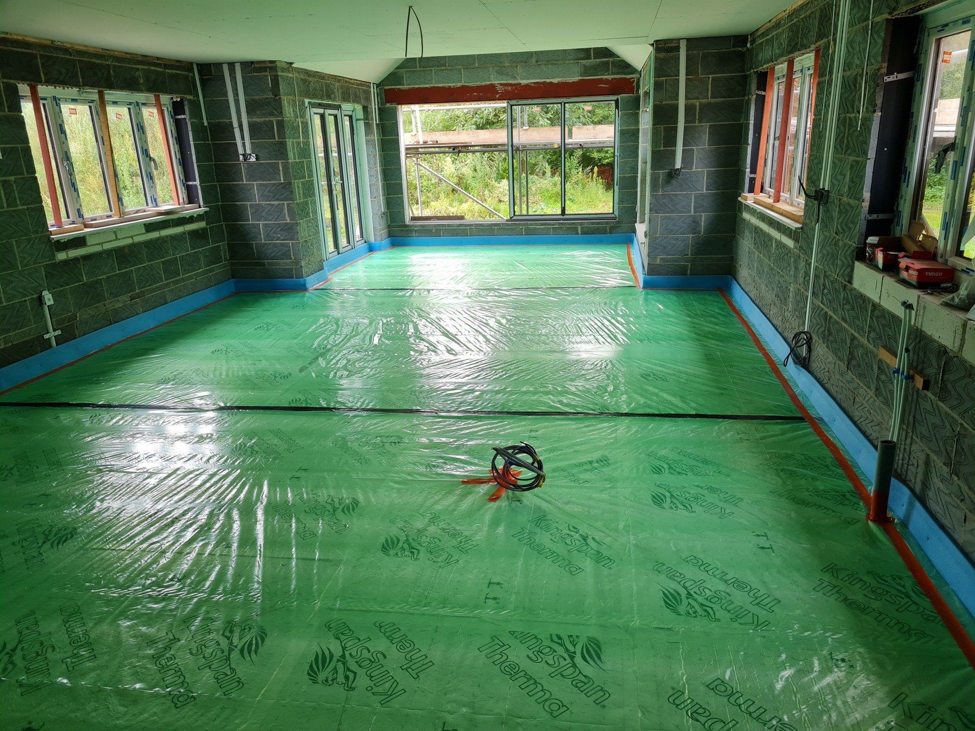 Tidy floor preparation with perimeter edging foam.