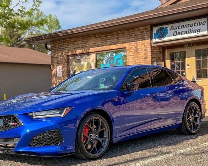 Blue Acura TLX Type S with a high-gloss finish after a professional ceramic coating