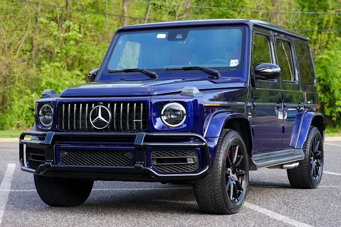 Blue Mercedes-Benz G-Wagon with PPF (paint protection film) parked in a driveway