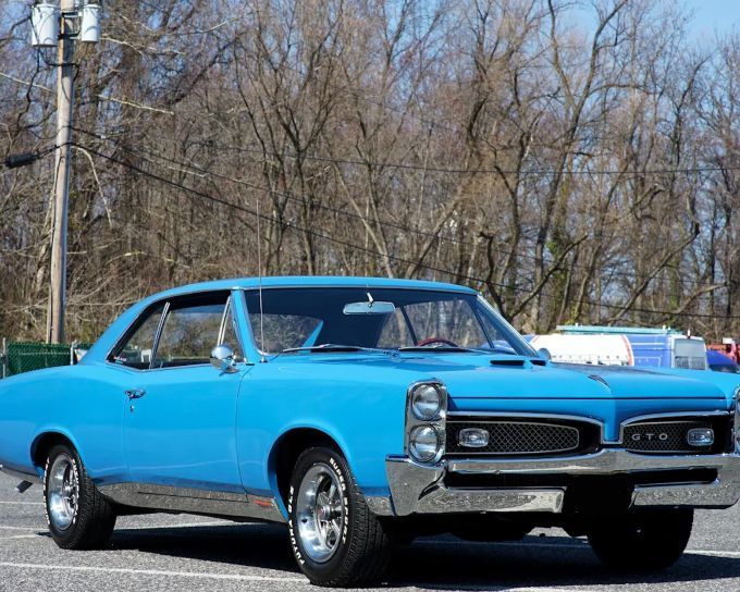 Classic blue Pontiac GTO with a restored, ceramic coating protected paint finish
