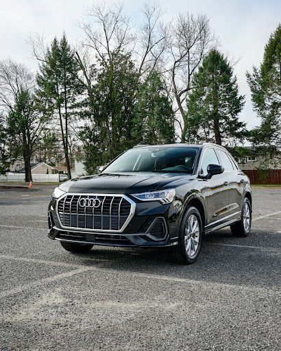 Black Audi Q3 SUV with PPF paint protection film applied, highlighting deep gloss finish and paint protection