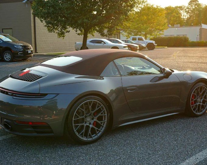 Gray Porsche 911 convertible with a deep gloss ceramic coating finish
