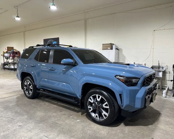 Blue Toyota 4Runner SUV in the shop after a professional ceramic coating application
