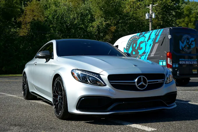 Silver Mercedes-Benz C63 AMG with ceramic coating applied, showcasing brilliant shine and paint enhancement