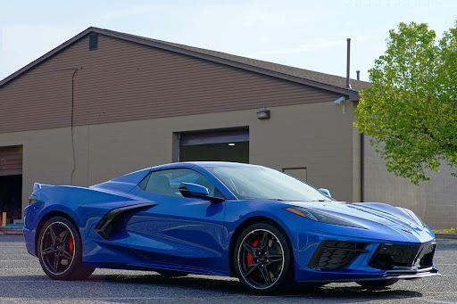 Blue Chevrolet C8 Corvette with PPF paint protection film applied, showcasing vibrant gloss finish and paint protection