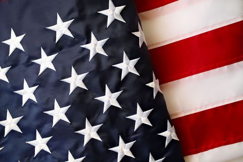 Close-up of the American flag with stars and red-and-white stripes