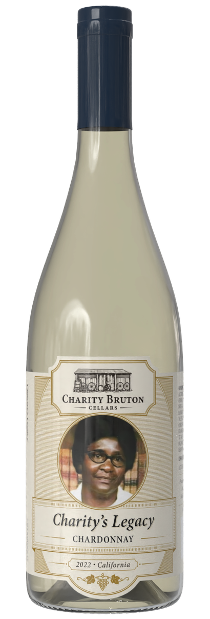 Wine bottle with cream label and dark blue cap, labeled “Charity’s Legacy.”