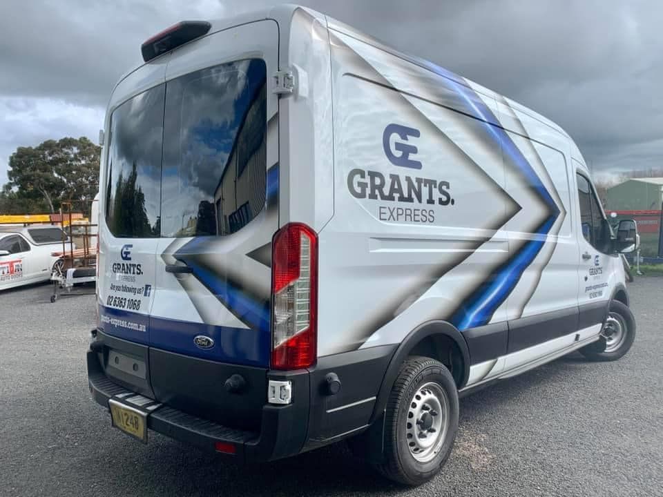 White Van With the Word Grants Express on It is Parked — Grants Express in Orange, NSW
