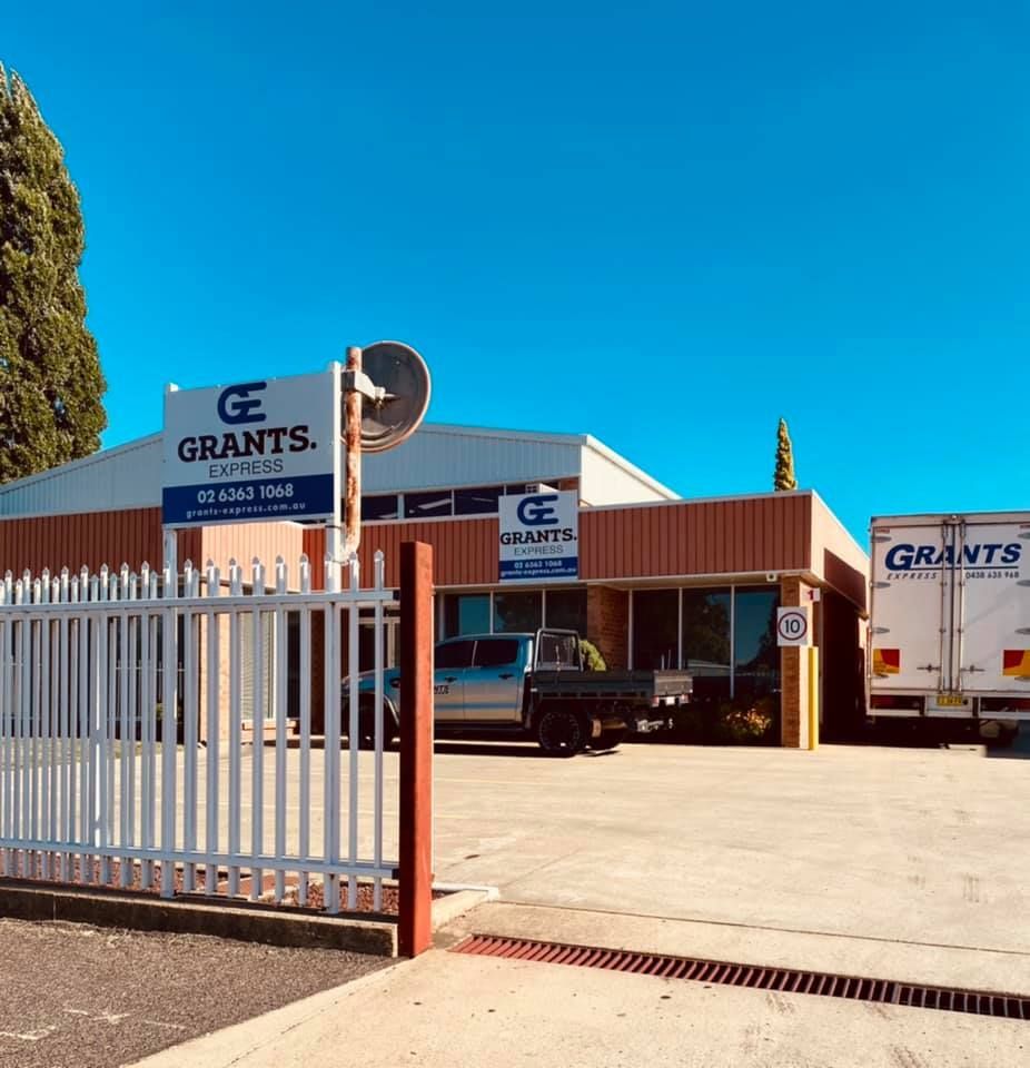 White Truck That Says Grants is Parked in Front of a Building — Grants Express in Bathurst, NSW