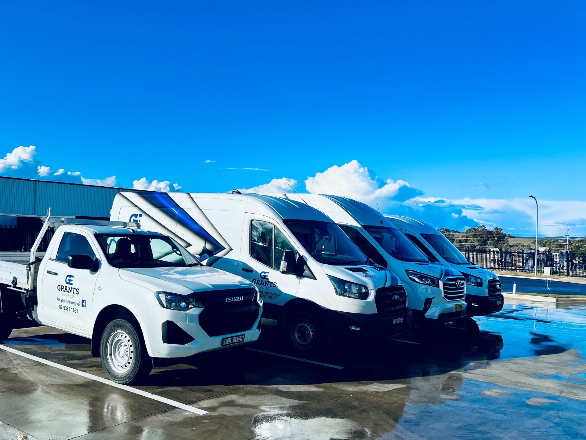 White Van With the Word Grants Express on It is Parked — Grants Express in Orange, NSW