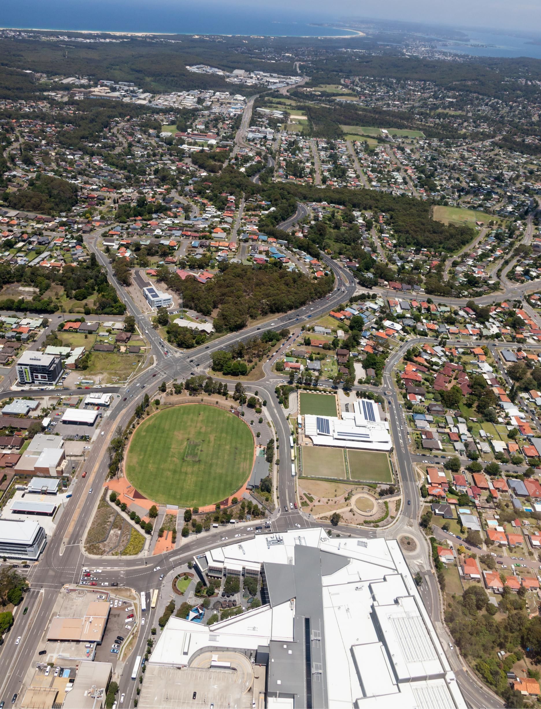 Aerial View of a City With a Large Building in the Middle — Grants Express in Pemulwuy, NSW