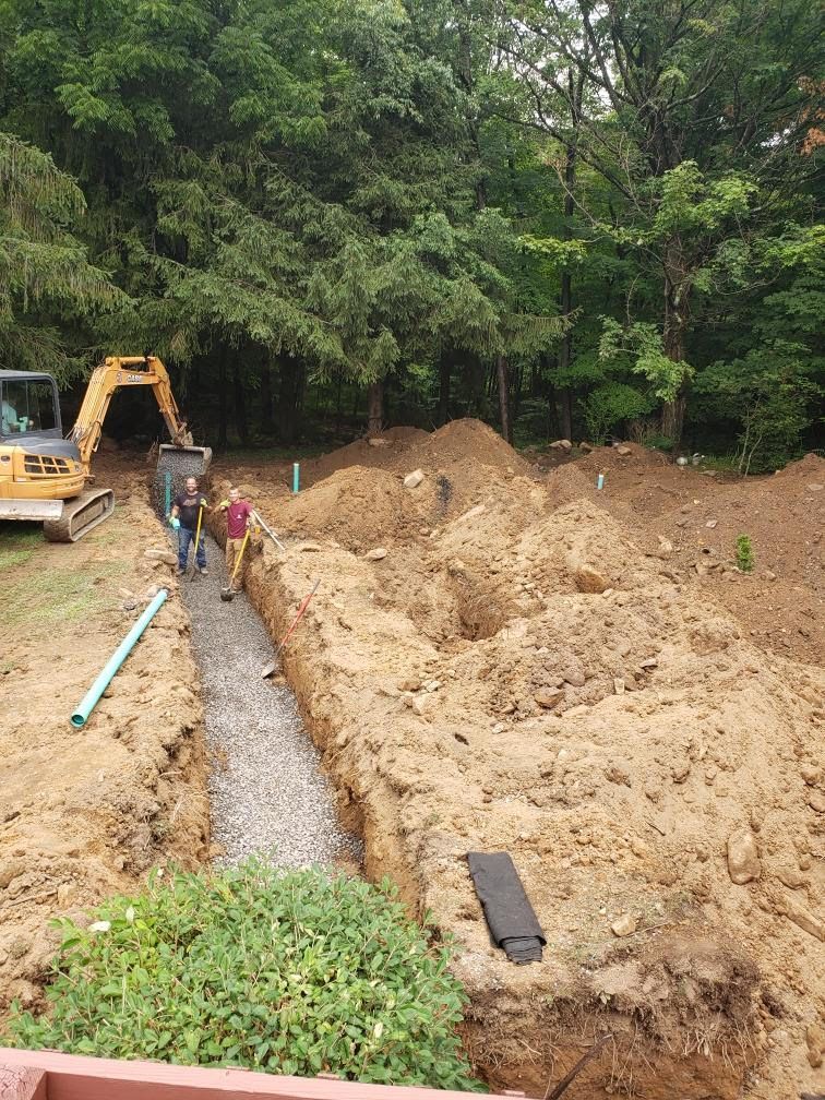 Backhoe Digging Pipe For Line – Cumberland, MD – Potomac Plumbing