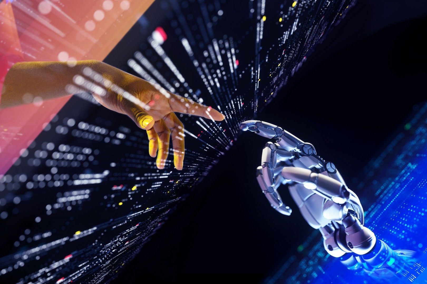 Un robot e una mano umana si stanno tendendo la mano.