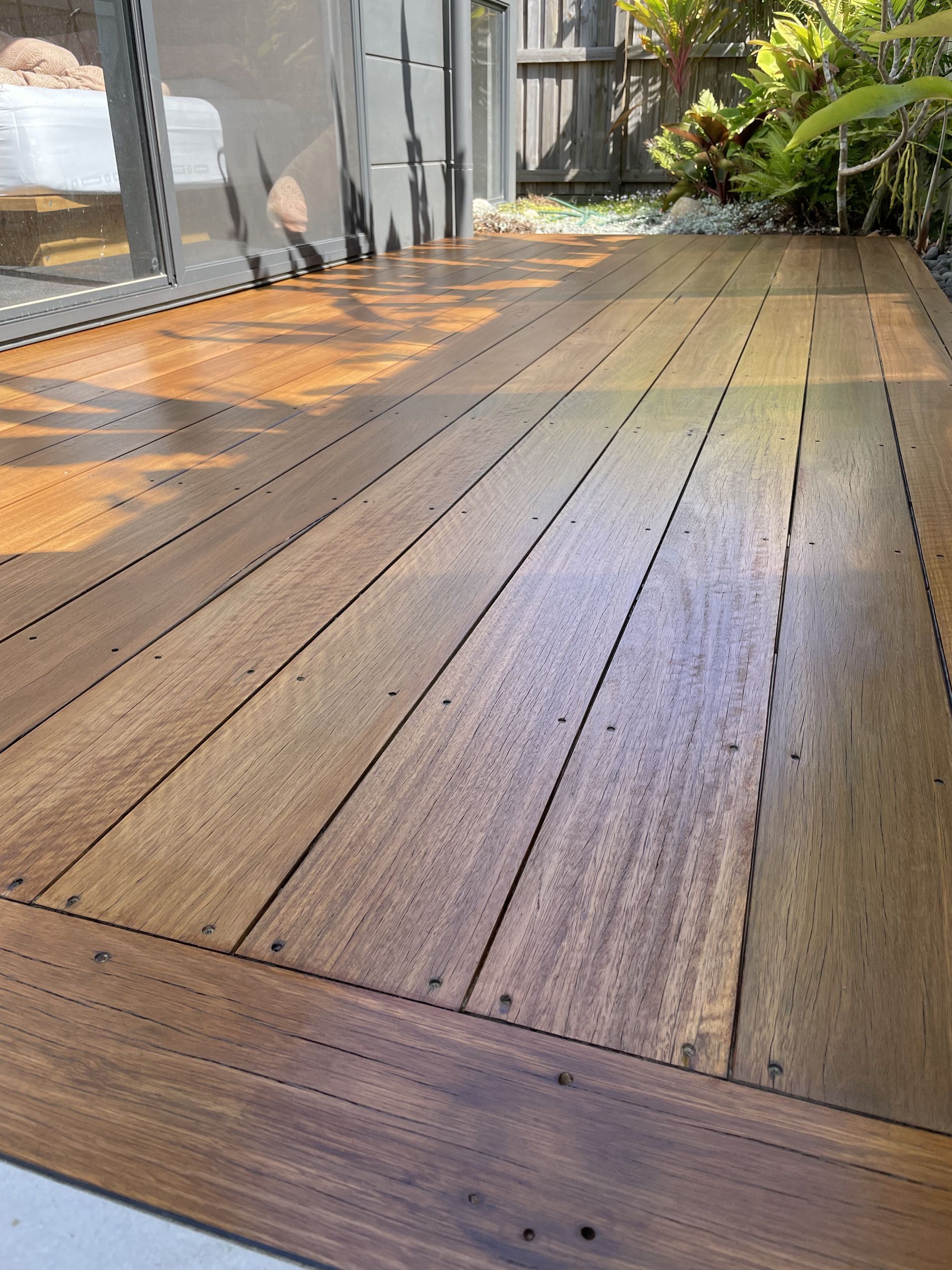 A Room With a Wooden Floor and a Radiator — Maroochy Floor Sanding in Noosa, QLD