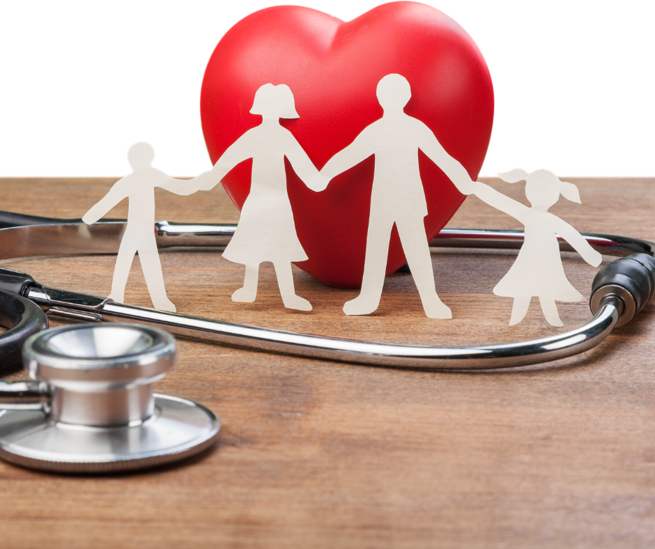A stethoscope sits next to a paper cut out of a family holding hands in front of a red heart