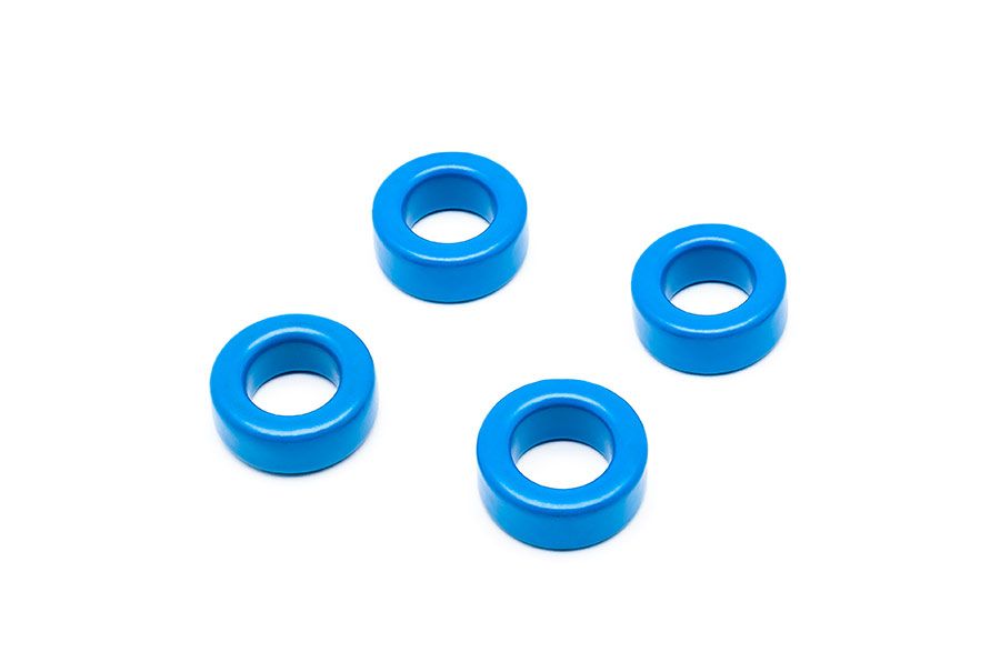 Quattro nuclei toroidali in ferrite blu.