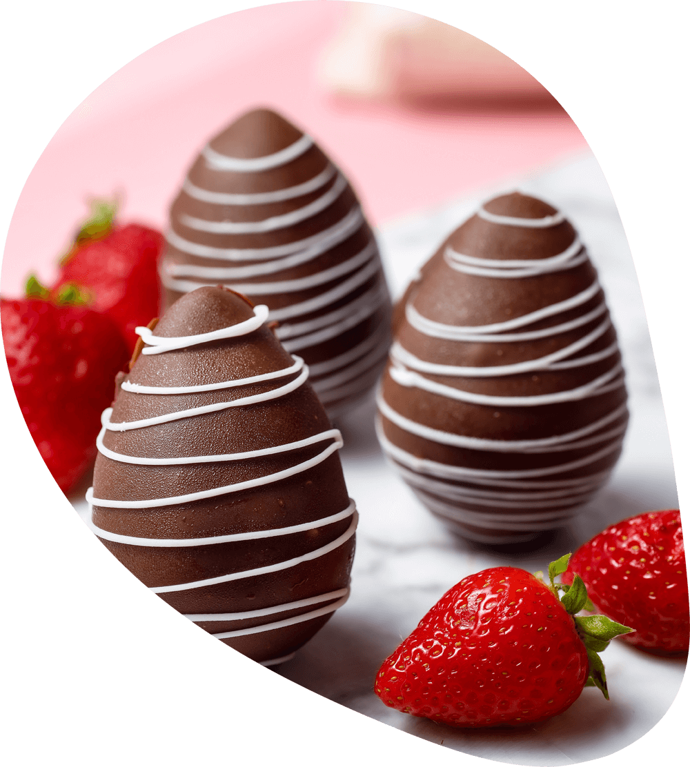 fresh strawberries and chocolate coated ones on table