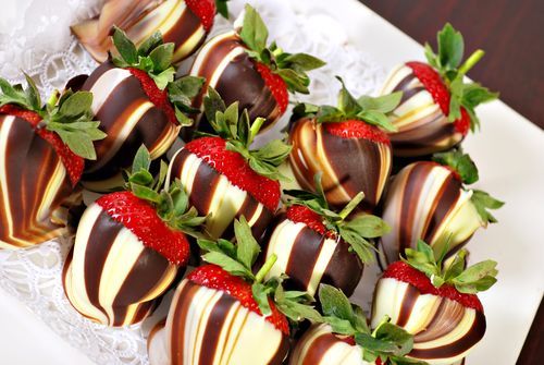 strawberries coated with dark and white chocolate