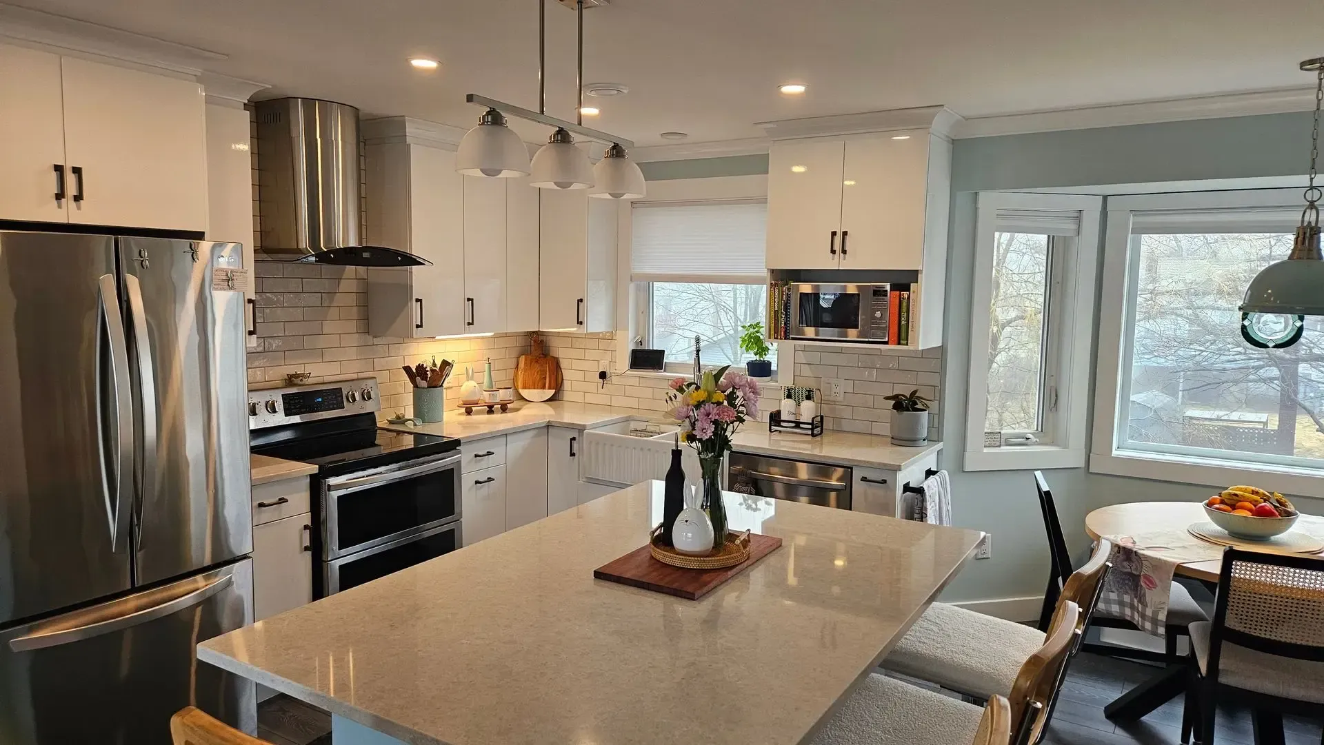 The completed kitchen remodeling project showcases a fully open-concept design serving a Dartmouth homeowner