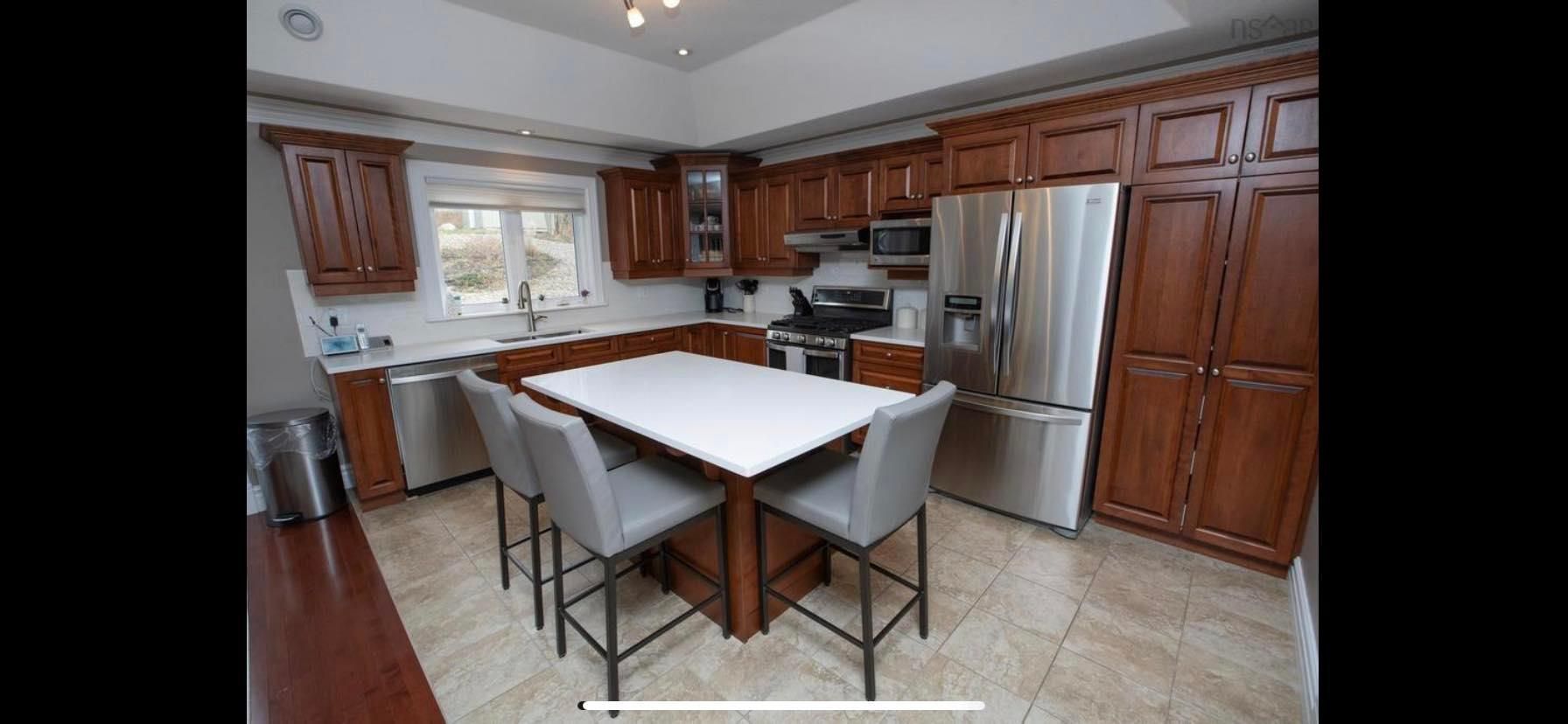 KItchen cabinet painting in Clayton Park Before  and after.