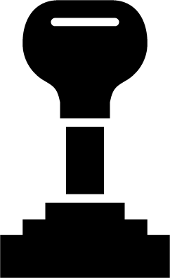 A black and white silhouette of a key on a white background.
