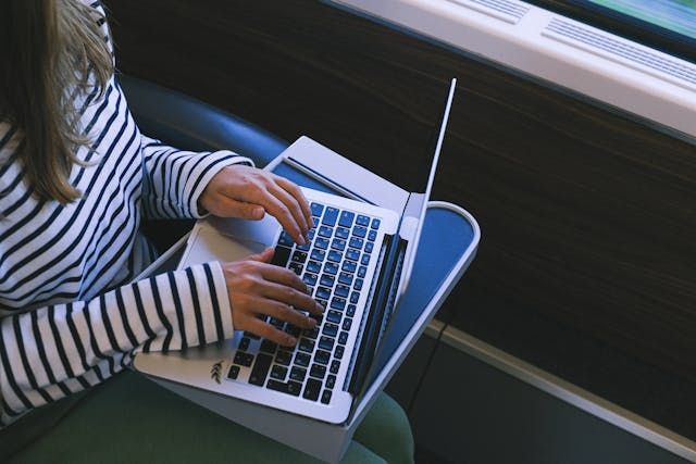person+working+on+a+computer