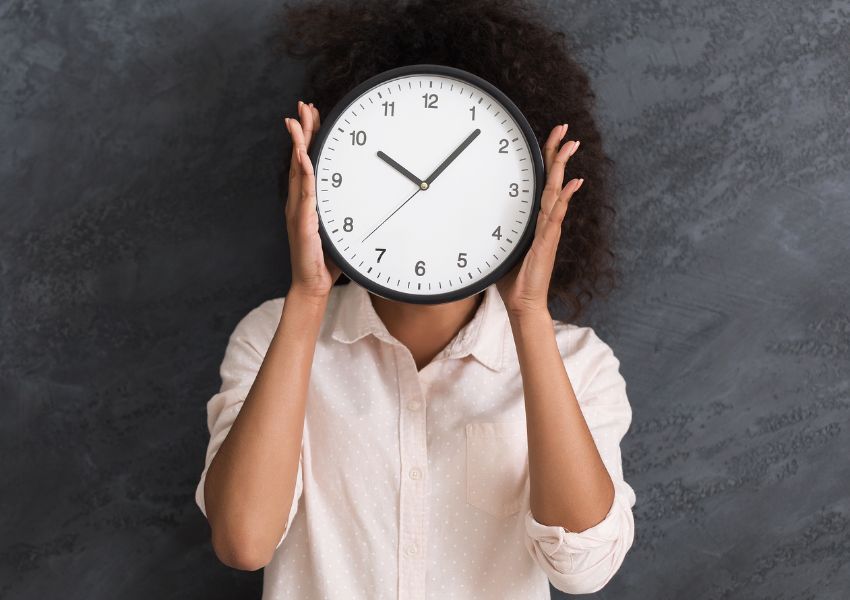 person-with-clock-over-their-face