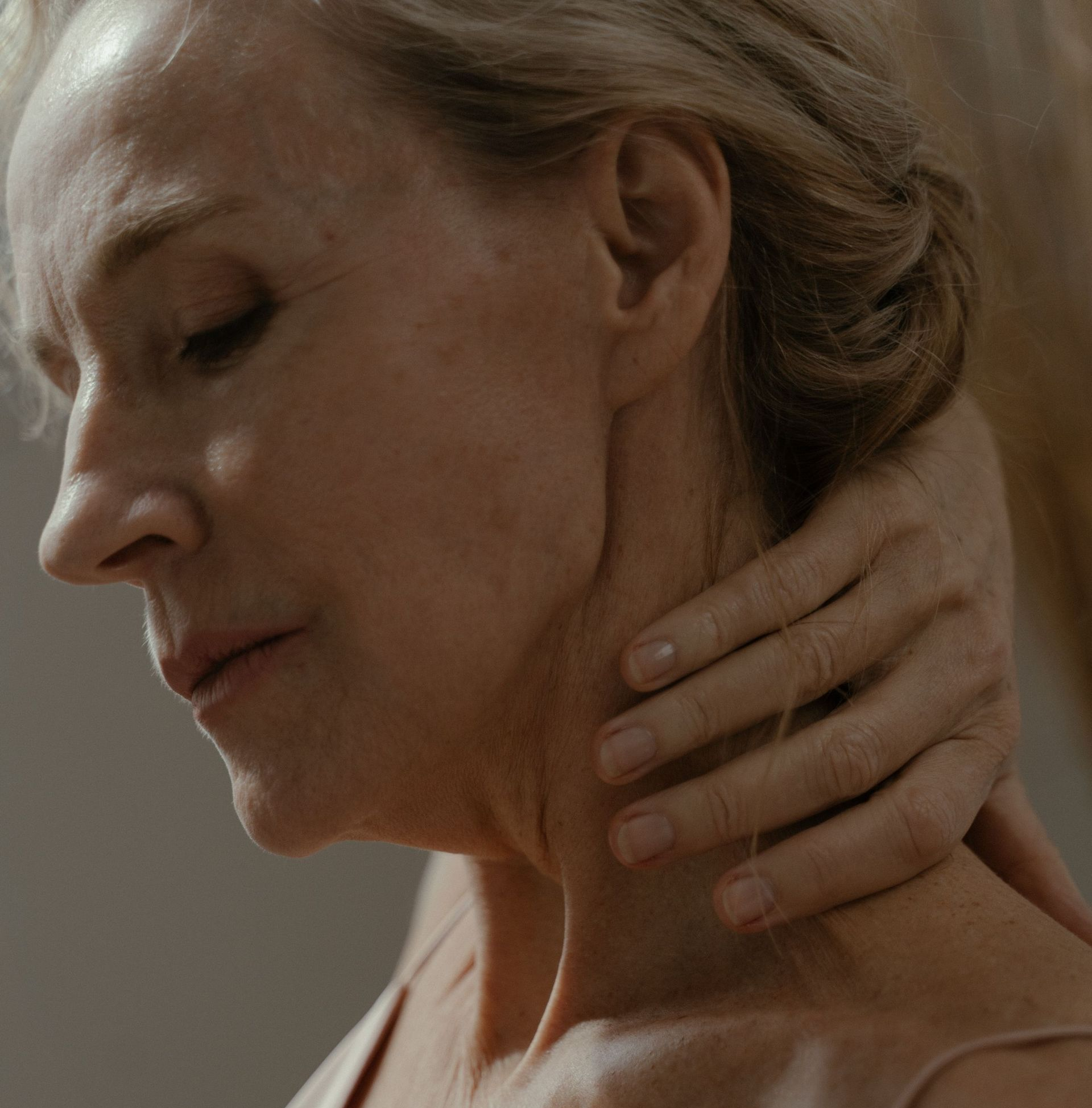 lady with tension in neck