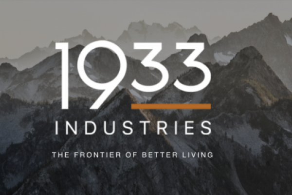 A poster for 1933 industries with mountains in the background