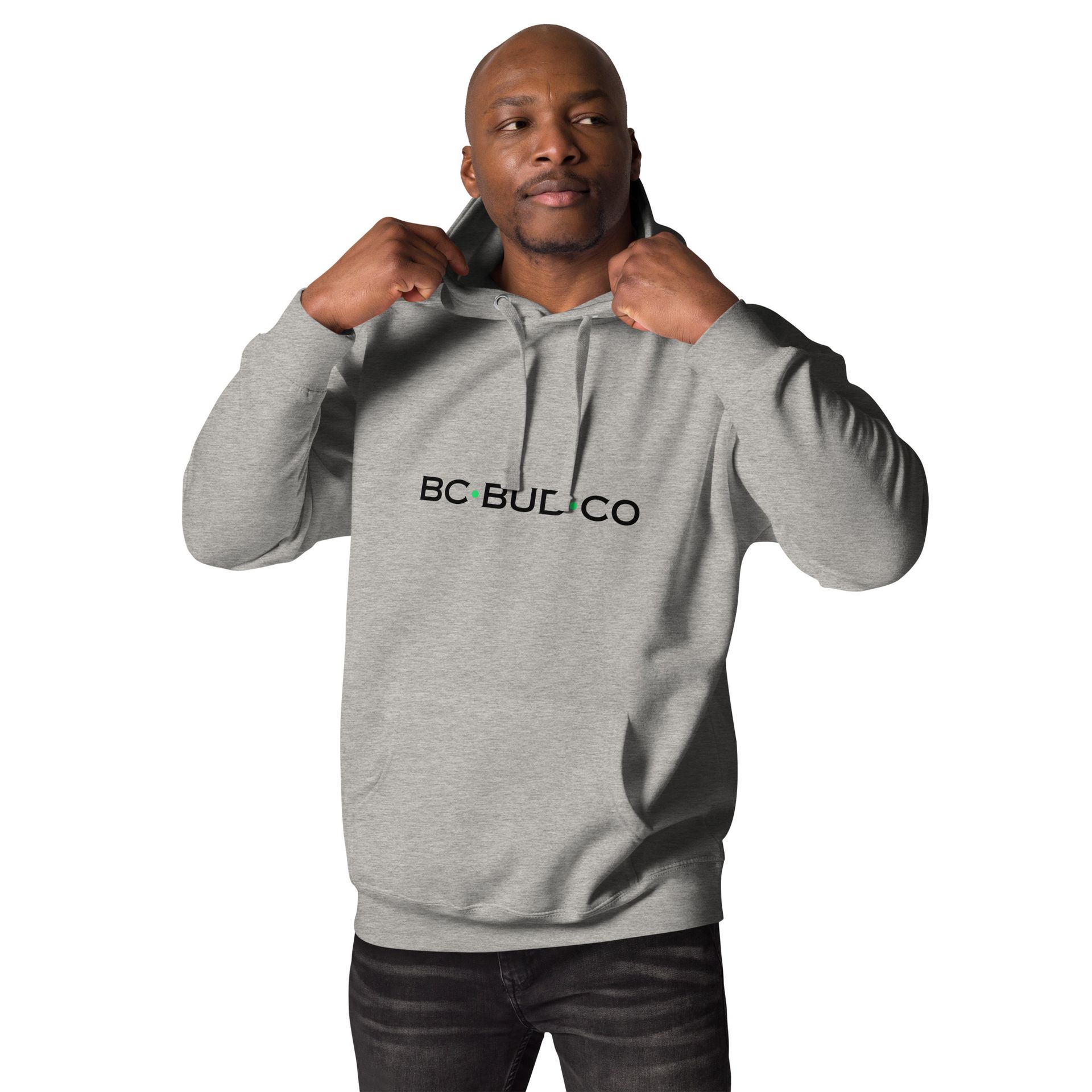 A man wearing a grey hoodie that says bc bul co
