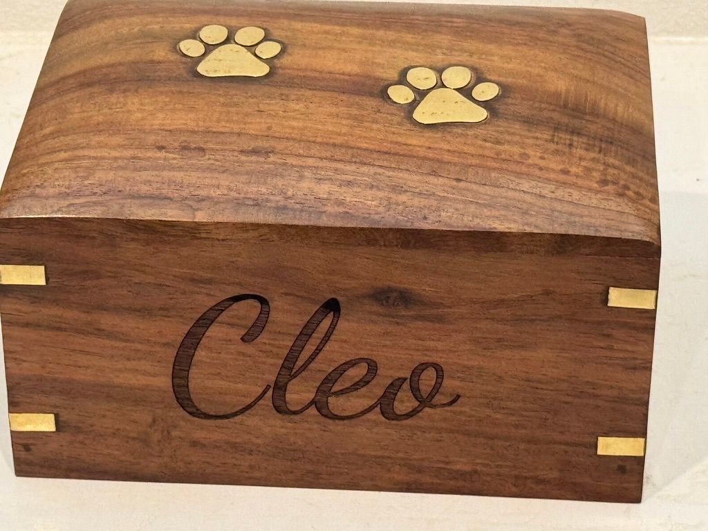 Wooden pet urn with 